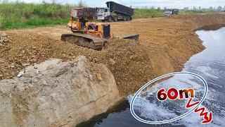 Massive Equipments Working Filling a Big Lake, KOMATSU Bulldozer, Dump Trucks Working