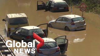 Rescuers in Germany search stranded vehicles as flood waters recede