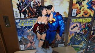 superman wonder woman the kiss statue