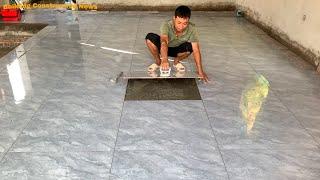 Workers Build The Living Room Floor On The 2nd Floor With Professional And Modern Ceramic Tiles