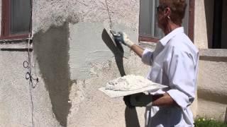 Buckling stucco in front of the home, structural cracks in stucco