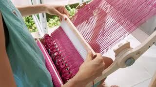 Weaving on an Ashford Knitters loom in Thailand. Fran Caselli