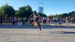 Street extreme show. (Acrobat in the cyr wheel  Aleksey Soldatov)