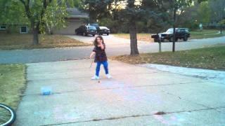 Samantha doing hopscotch w/leg braces