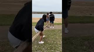She jabbed him in the butt with a giant stick!