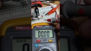 Multimeter measuring current red LEd 220 ohms and 5V #short #shorts #electronics