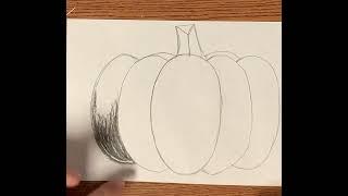 Shading a pumpkin with charcoal