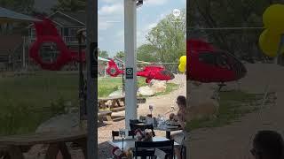 Helicopter rolls onto its side during landing in Michigan