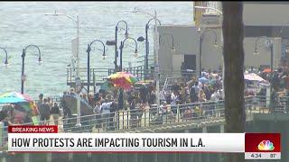 Tourists share their experience visiting Los Angeles during a week of protests