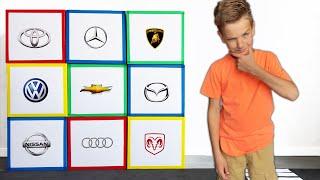 Mark learn popular car brands with cardboard garages