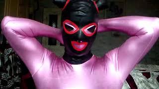 Zentai Girl Putting on Latex Mask