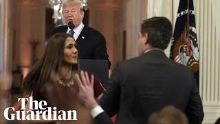 White House accuses CNN’s Jim Acosta of 'placing his hands' on young 'intern'