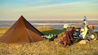 Honda C90 solo winter moto camp.