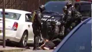 Riot Squad swoop to end standoff outside NSW Parliament