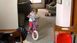 ALH riding bike in house