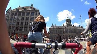 Amsterdam by bicycle -ARBT - Nieuwmarkt, Dam square, Westerkerk. S. Vath / mind games