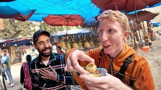 Friendly Indian man won't stop feeding me Pani Puri in Delhi 