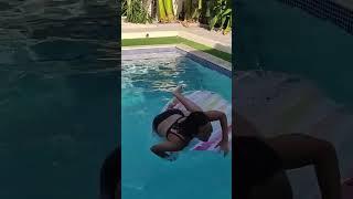 Cute Japanese Girl Trying to Stand up on an Inflatable Raft in a Swimming Pool #shorts
