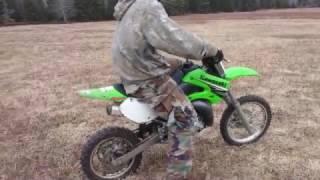 2009 Kawasaki KX65 top speed & me taking a lap (NOT 70MPH LIKE THE KID SAYS.)