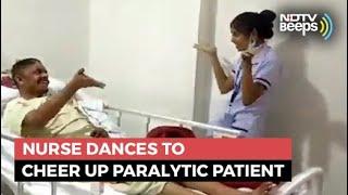 Nurse Dances With Patient For Physiotherapy