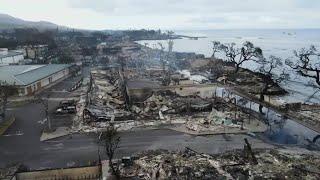 Firefighters race to contain raging wildfires across Hawaii as death toll rises