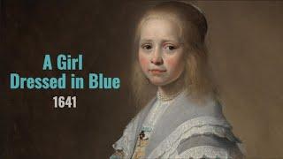 A Glimpse into Elegance: The Enigmatic Girl in Blue