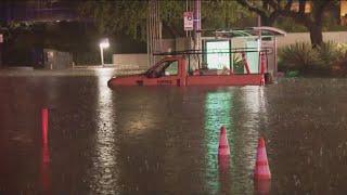 Multiple cars submerged, people rescued in flooded intersections throughout San Diego