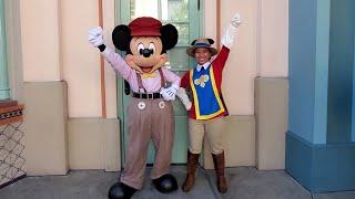 I as Musketeer Mickena hugs and poses with Buena Street Mickey Mouse in DCA 2024