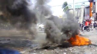 Barricades burn as Haitians demand President Jovenel Moïse step down