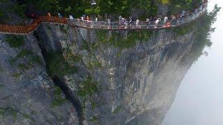 Meet the Chinese workers who risk their lives building cliff walks for a living