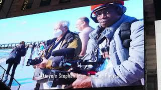 Akinyele Stephen Video and Still Photographer from Trading Photos in Action Times square Advertise