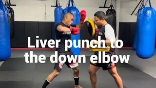 Muay Thai Move of The Month: Liver Punch to Downward Elbow