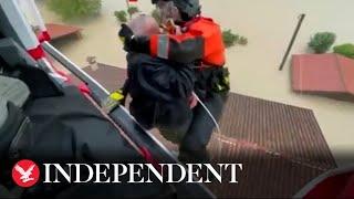 Emilia Romagna floods  Elderly residents airlifted from roof as water surrounds house