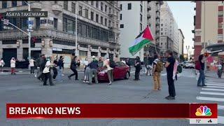 Hit-and-run driver strikes protester in downtown LA