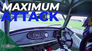 Onboard Andrew Jordan wrestles bucking Mini round Goodwood | Revival 2021