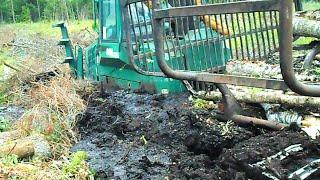 Timberjack 810D stuck in deep mud , extreme conditions