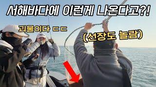 Korean girl catching a big pink fish