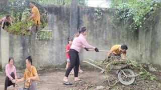 Mr. Vang and Ms. Dam cleaned up the place to prepare for building a new house.