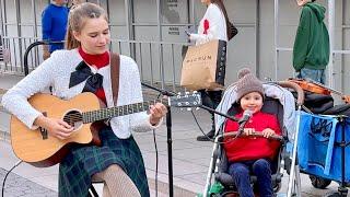 3-year-old SINGER IN A STROLLER joins "Feliz Navidad" - Karolina Protsenko