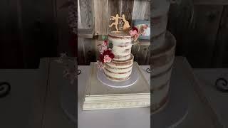 2 tier semi naked wedding cake with cupcakes | Wedding cake decor idea