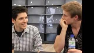 Colin Morgan making Bradley James laugh..