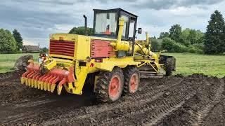 Grader working on the land