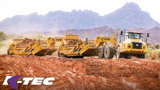 Optimize Your Fleet with K-Tec Scrapers & CAT Trucks