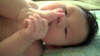 baby sucks toe and farts