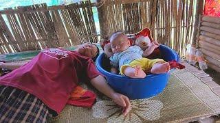 Daily work of a single mother with children, weeding pineapple