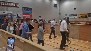 Independent councillor Dan McCarthy celebrates his re-election with a line dance