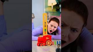 She ruined my dominos!Cool train tool help me @GoGizmo #shorts #gadget #dominotrain #kidstoys