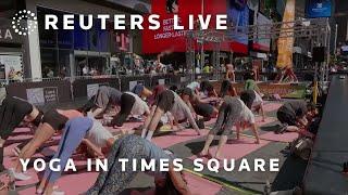 LIVE: People practice yoga in New York's Times Square