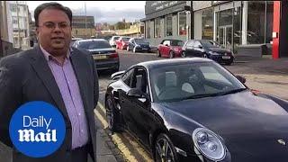 Huddersfield car dealer says he just want to carry on with his business