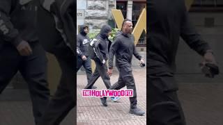 Chris Brown Spits On The Ground While Leaving His Hotel With Heavy Security In Amsterdam